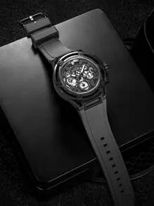 Montre multifonction GUESS pour homme en gris métallisé.